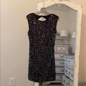 Black and gold sequined dress
